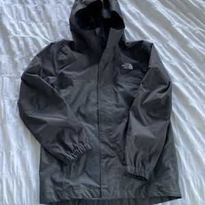 Northface boys size 7/8 rain coat never worn. New without tags